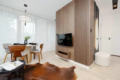 Telewizja i/lub zestaw kina domowego w obiekcie Apartment Sarmacka Wilanów with Parking, Sauna & Gym by Noclegi Renters