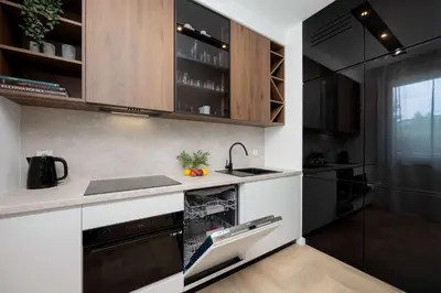 Kuchnia lub aneks kuchenny w obiekcie Apartment Sarmacka Wilanów with Parking, Sauna & Gym by Noclegi Renters