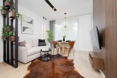 Część wypoczynkowa w obiekcie Apartment Sarmacka Wilanów with Parking, Sauna & Gym by Noclegi Renters