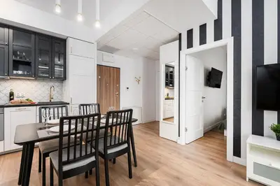 Kuchnia lub aneks kuchenny w obiekcie Wola Cozy Apartment by P&O Apartments