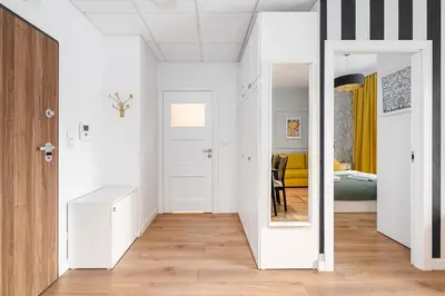 Łóżko lub łóżka w pokoju w obiekcie Wola Cozy Apartment by P&O Apartments
