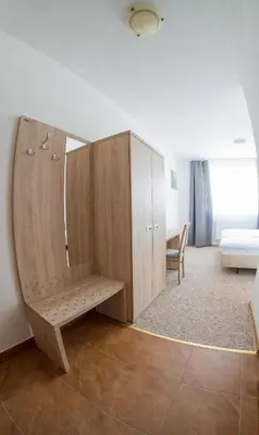 Łóżko lub łóżka w pokoju w obiekcie Patra