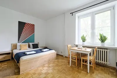 Łóżko lub łóżka w pokoju w obiekcie Urban Nest - Marszałkowska 140