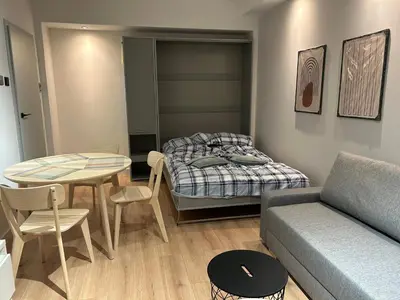 Łóżko lub łóżka w pokoju w obiekcie Sunray Apartament
