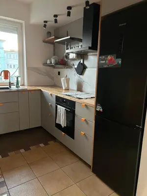 Kuchnia lub aneks kuchenny w obiekcie Sunray Apartament