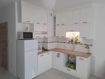 Kuchnia lub aneks kuchenny w obiekcie Apartament Cykady pod Warszawą
