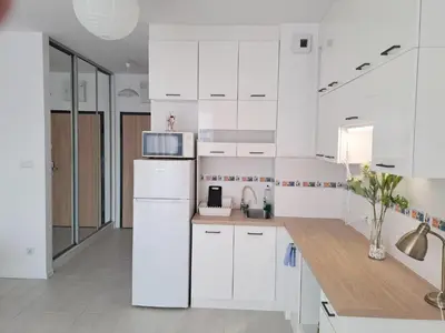 Kuchnia lub aneks kuchenny w obiekcie Apartament Cykady pod Warszawą