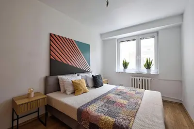 Łóżko lub łóżka w pokoju w obiekcie Urban Nest - Sonaty 6c