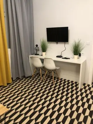 Telewizja i/lub zestaw kina domowego w obiekcie Apartment z klimatem - blisko centrum