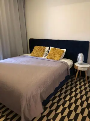 Łóżko lub łóżka w pokoju w obiekcie Apartment z klimatem - blisko centrum