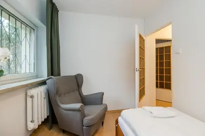Łóżko lub łóżka w pokoju w obiekcie ShortStayPoland Piekałkiewicza B112