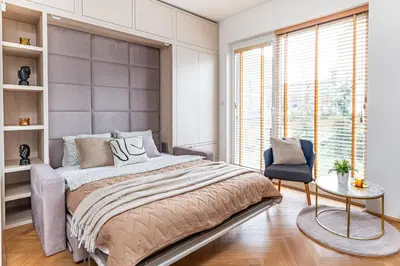 Łóżko lub łóżka w pokoju w obiekcie SuperApart Branickiego Apt 39