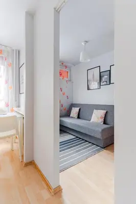 Łóżko lub łóżka w pokoju w obiekcie Grzybowska str Apt City center