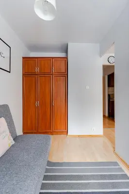 Łóżko lub łóżka w pokoju w obiekcie Grzybowska str Apt City center