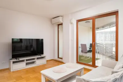 Telewizja i/lub zestaw kina domowego w obiekcie Wronia Business Superior Residence by BookingHost