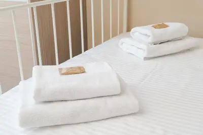 Łóżko lub łóżka w pokoju w obiekcie Bemowo Lazurowa Comfort Apartment by BookingHost