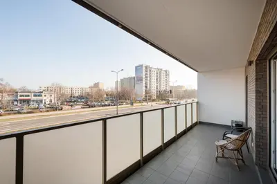 Balkon lub taras w obiekcie Bemowo Lazurowa Comfort Apartment by BookingHost