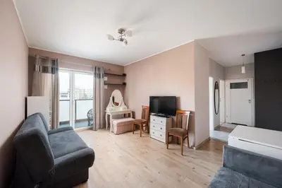 Telewizja i/lub zestaw kina domowego w obiekcie Bemowo Lazurowa Comfort Apartment by BookingHost