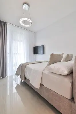 Łóżko lub łóżka w pokoju w obiekcie Prestige Skyview Residence