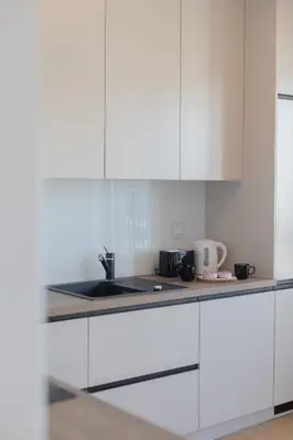 Kuchnia lub aneks kuchenny w obiekcie Optyków Spacious & Cosy Apartment with Parking by Noclegi Renters