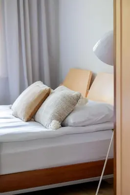 Łóżko lub łóżka w pokoju w obiekcie Suwalska Comfort Family Apartament with Balcony Warsaw by Noclegi Renters
