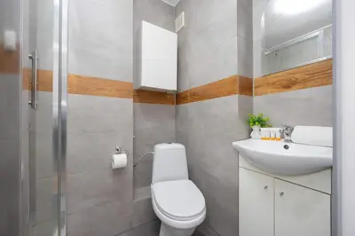 Łazienka w obiekcie Suwalska Comfort Family Apartament with Balcony Warsaw by Noclegi Renters