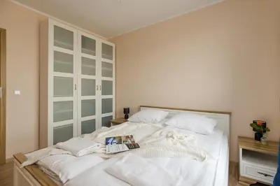 Łóżko lub łóżka w pokoju w obiekcie ShortStayPoland Toruńska B177