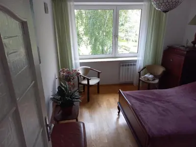 Łóżko lub łóżka w pokoju w obiekcie Cichy i przyjemny pokój na Muranowie