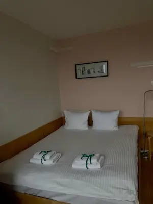 Łóżko lub łóżka w pokoju w obiekcie Studio Smolna