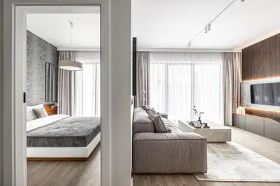 Łóżko lub łóżka w pokoju w obiekcie CHRONOS APARTAMENTY with Parking and Air Conditioning in Warsaw Wola by Renters Prestige