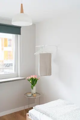 Łóżko lub łóżka w pokoju w obiekcie Chmielna Central Apartments