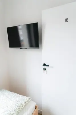 Telewizja i/lub zestaw kina domowego w obiekcie Chmielna Central Apartments