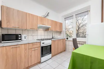 Kuchnia lub aneks kuchenny w obiekcie Nowolipie 26 by Homeprime
