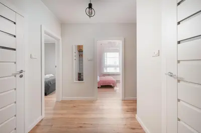 Łóżko lub łóżka w pokoju w obiekcie Raków Stylish Apartment by BookingHost