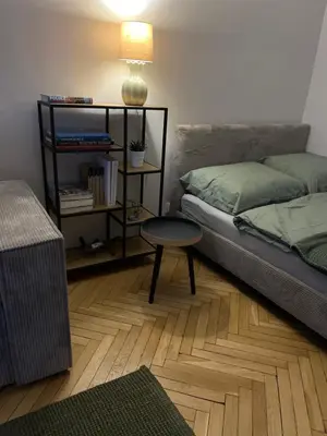 Łóżko lub łóżka w pokoju w obiekcie Zielona Ochota