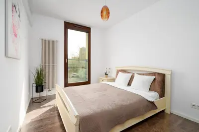 Łóżko lub łóżka w pokoju w obiekcie Urban Apartaments - Great Location - City Center - Kolejowa