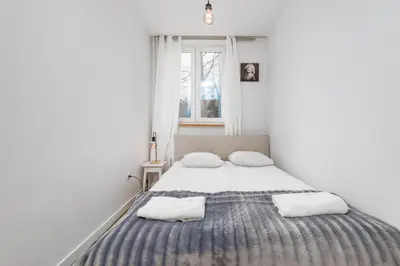 Łóżko lub łóżka w pokoju w obiekcie Sobieskiego 70 by Homeprime