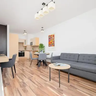 Spacious Apartment with Parking and Balcony by Noclegi Renters