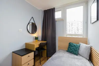 Łóżko lub łóżka w pokoju w obiekcie ROOMs Krochmalna 3