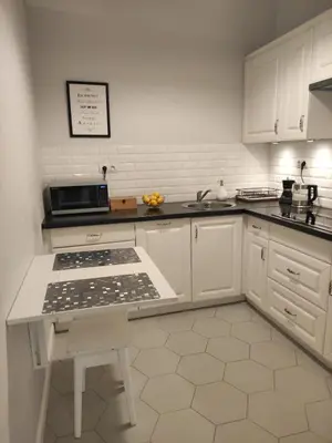 Kuchnia lub aneks kuchenny w obiekcie Apartment - City Center!