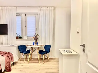 Telewizja i/lub zestaw kina domowego w obiekcie Apartel24pl Mozart Apartments