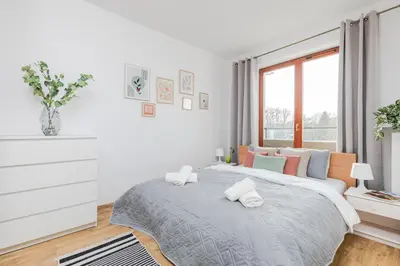 Łóżko lub łóżka w pokoju w obiekcie Apartament Kiedacza, Darmowy Parking