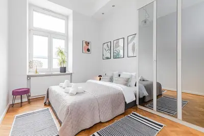 Łóżko lub łóżka w pokoju w obiekcie Apartament Smolna, Centrum