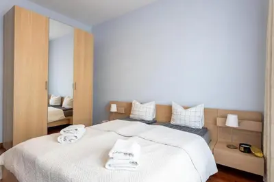 Łóżko lub łóżka w pokoju w obiekcie Urban Apartaments - Great Location - City Center - Stawki