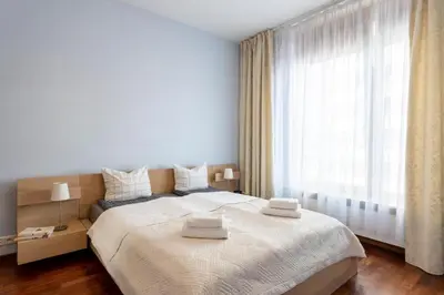 Łóżko lub łóżka w pokoju w obiekcie Urban Apartaments - Great Location - City Center - Stawki