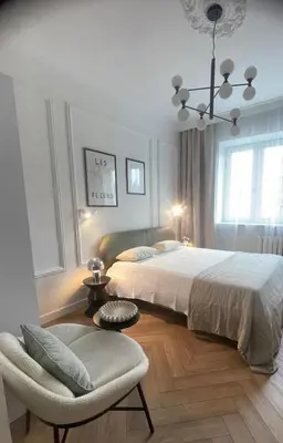 Łóżko lub łóżka w pokoju w obiekcie Apartament Puławska 34
