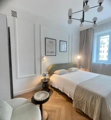 Łóżko lub łóżka w pokoju w obiekcie Apartament Puławska 34