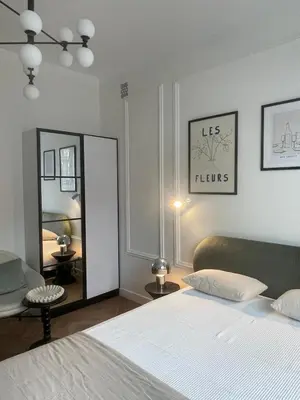 Łóżko lub łóżka w pokoju w obiekcie Apartament Puławska 34