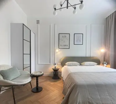 Łóżko lub łóżka w pokoju w obiekcie Apartament Puławska 34