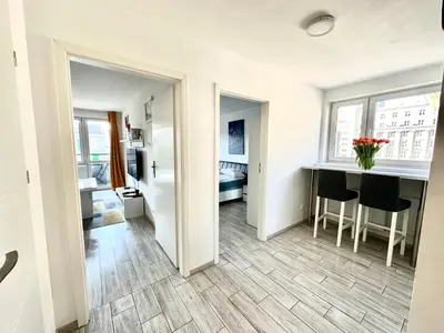 Część wypoczynkowa w obiekcie OhMyHome Panorama Apartament w Centrum Warszawy z widokiem na Pałac Kultury